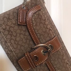Sweet 4 1/2” x 7 1/2” Coach wristlet in brown